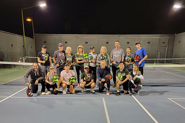 Tennis players at night