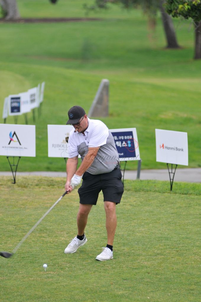tournament player taking a swing 
