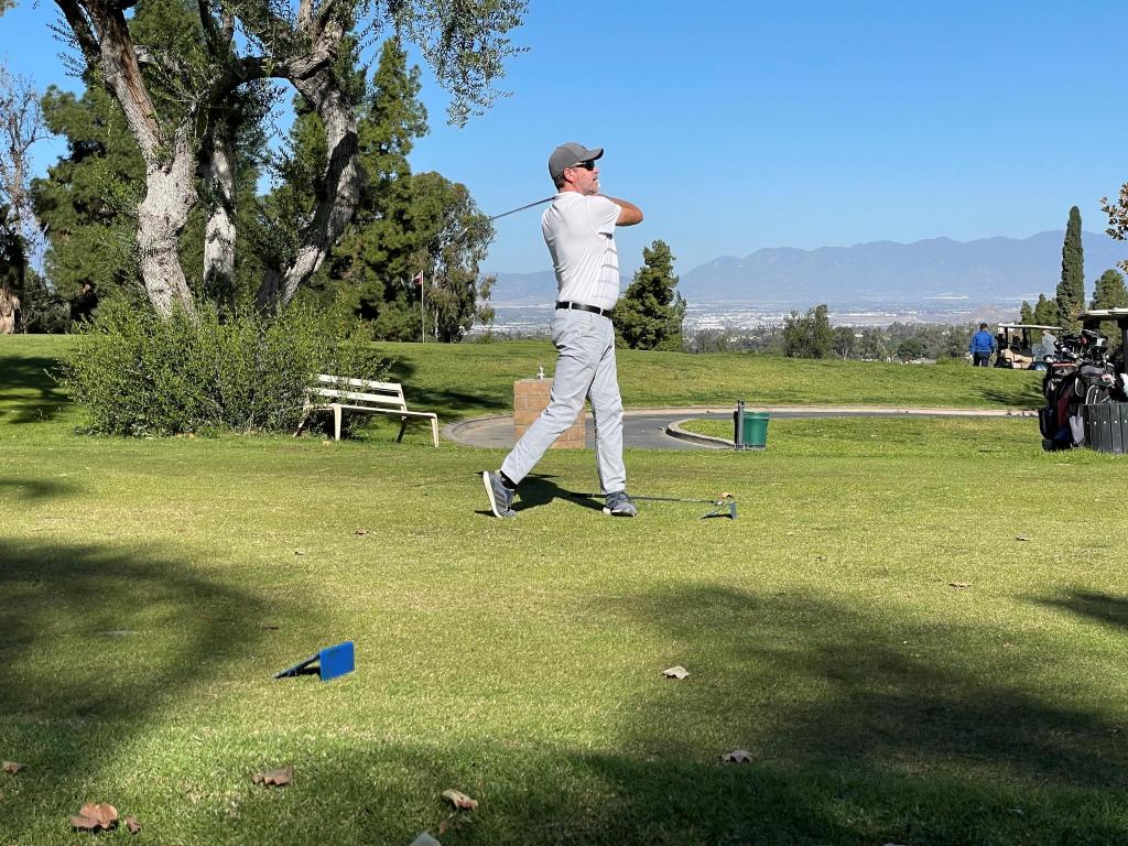 golfer taking a swing